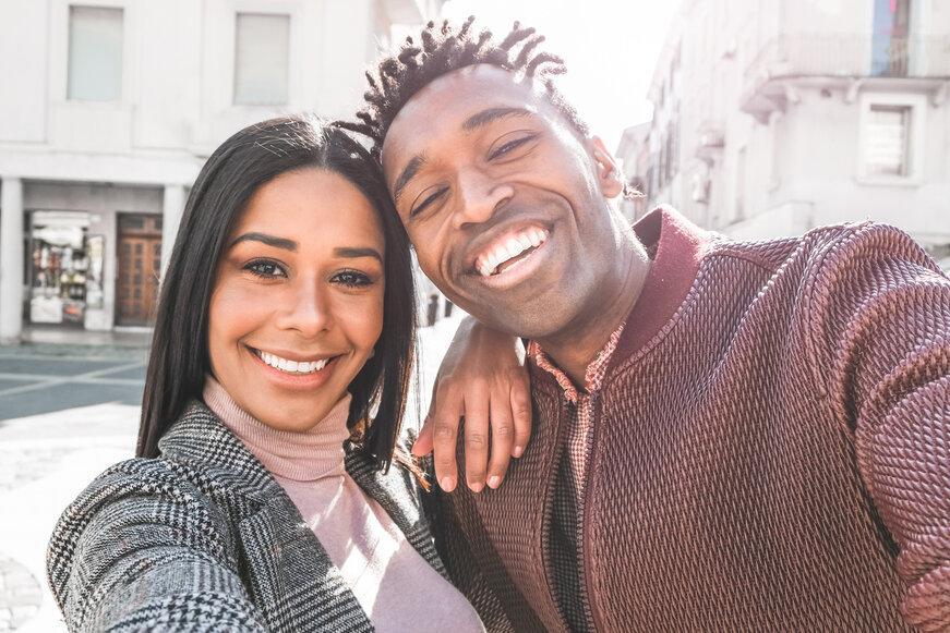 man and woman smiling while taking a selfie in Germantown MD