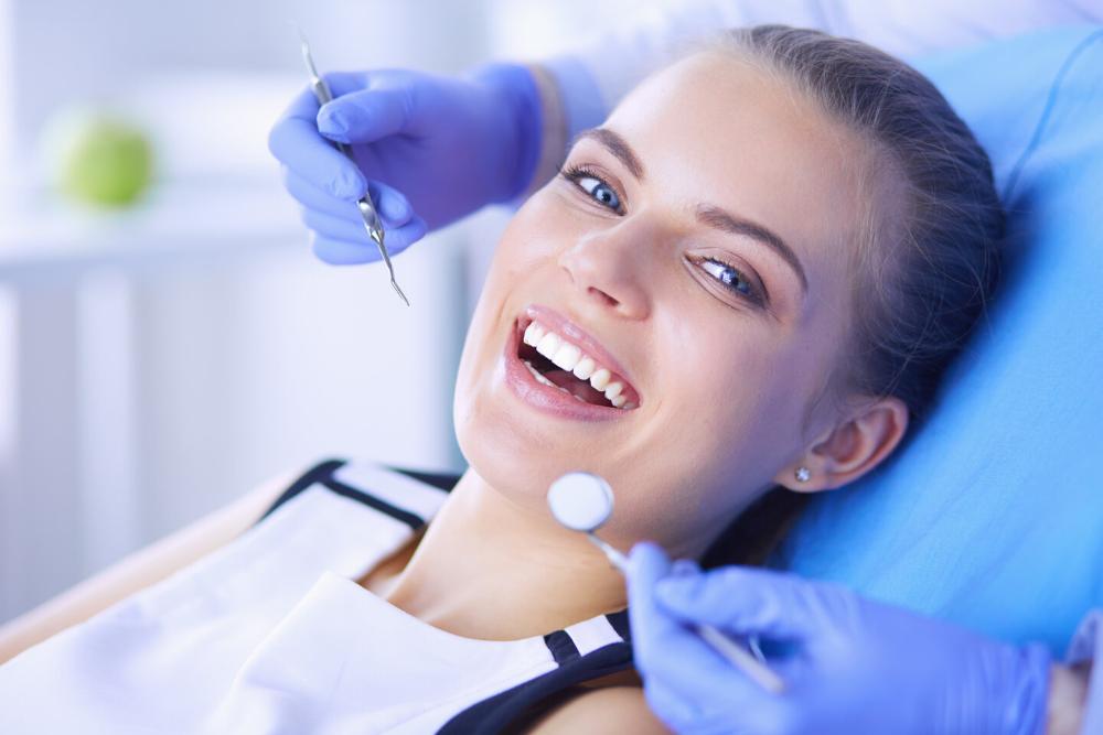 patient smiling after tooth extraction in germantown