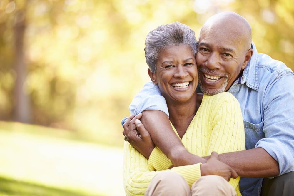 Older couple smiling at a park in Germantown MD