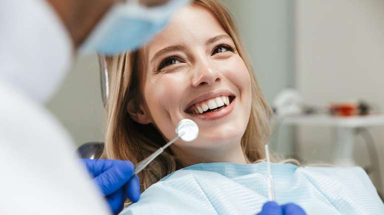 germantown woman smiling in a dental chair